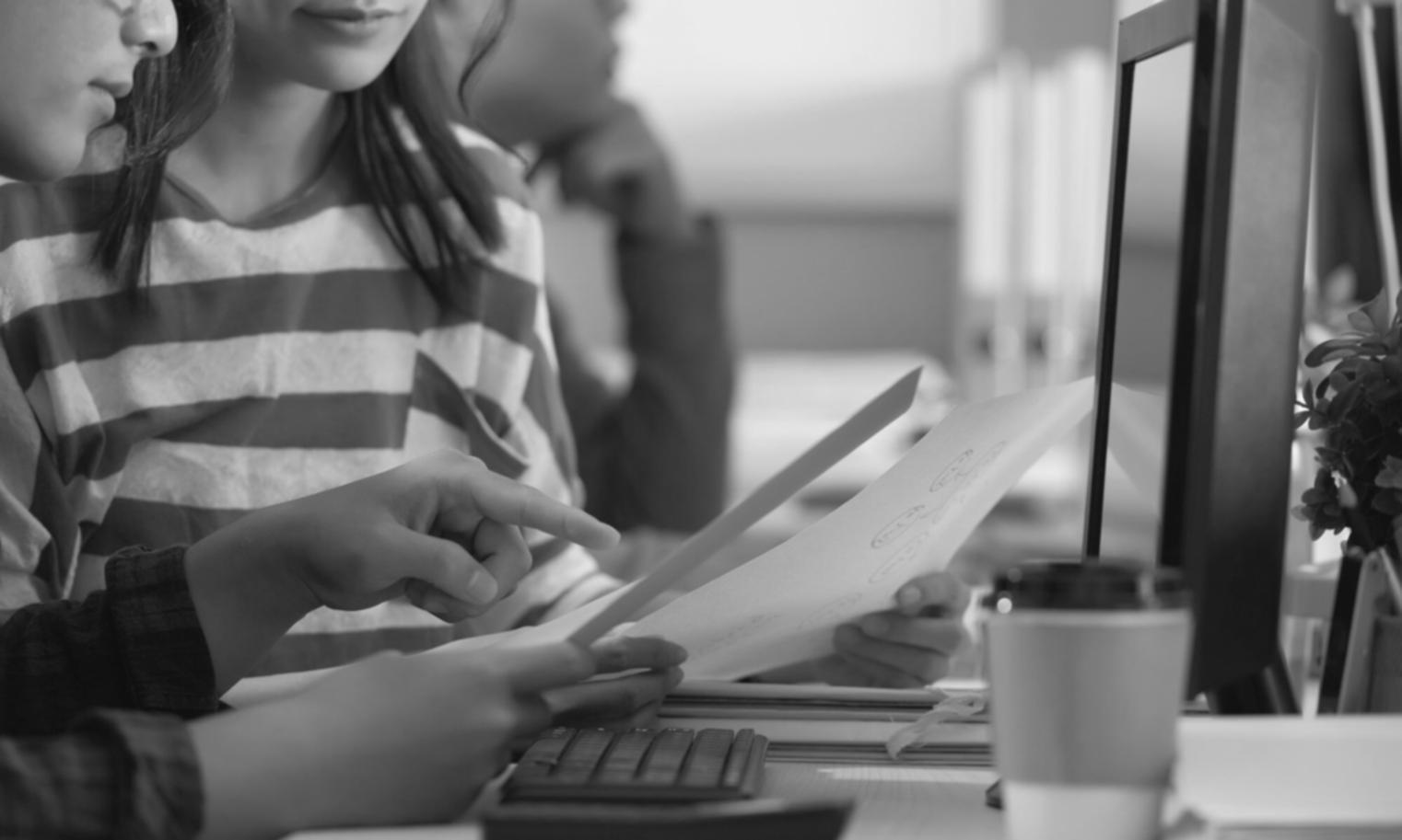 Professional financial planning workspace showing budget documents and planning tools